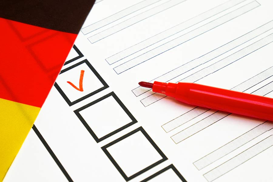 Roter Haken auf einer Liste für die Haartransplantation Finanzierung bei Elithair Deutschland